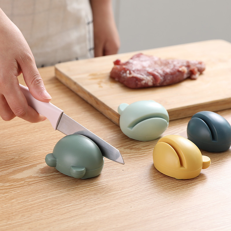 Manual stone knife sharpener